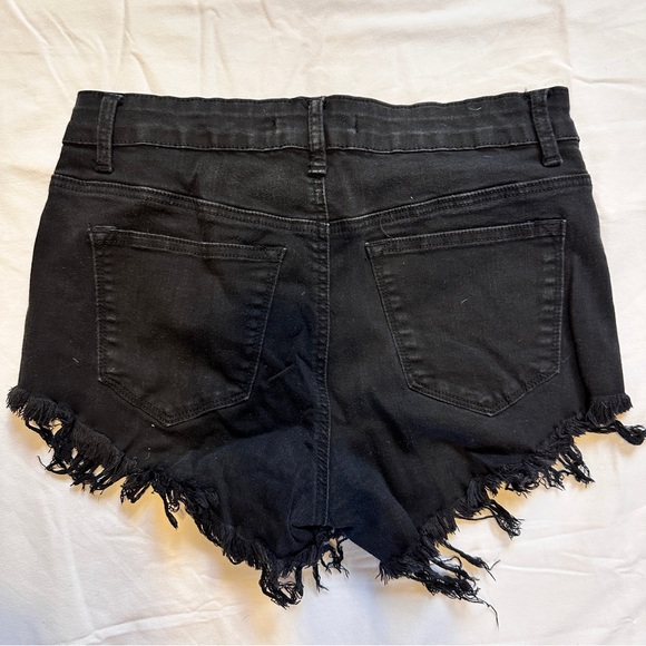 Short black frayed booty shorts. - Picture 2 of 3